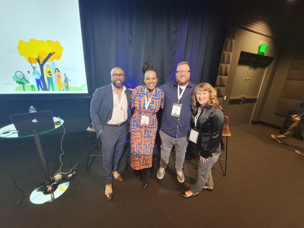Rica Elysée on stage with three fellow panelists at the Marketplace Risk Management Conference in San Francisco